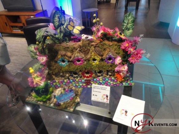 One of the birdhouses at the auction inspired by Tinkerbell. Image from Nowyouknowevents.com